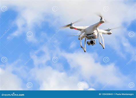 white quadcopter drone  camera   blue sky stock image image  outdoors digital