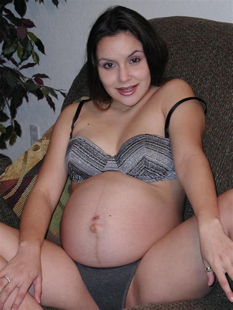 horny pregnant woman masturbating her hairy pussy on the sofa pichunter