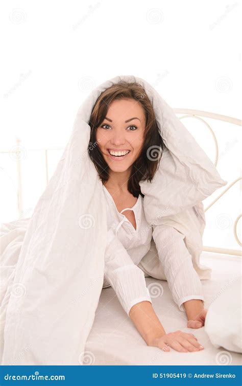 young astonished woman covered  blanket stock image image