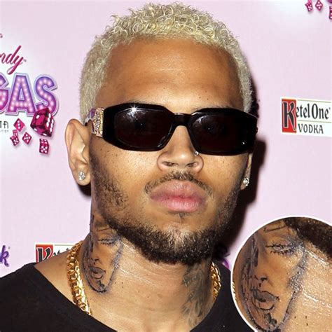 chris brown defends his non rihanna neck tattoo i m an artist and