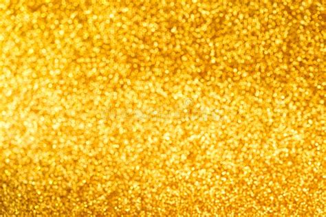 christmas creative shiny gold color background flat lay stock photo