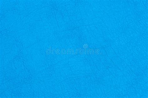 oppervlakte faux leer met vouwen  blauwe kleur als achtergrond  textuur stock afbeelding