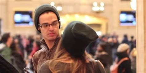 girl wanders around grand central trying to kiss strangers and it s