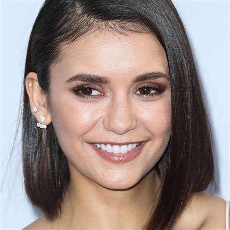 Nina Dobrev Shows Off Her Super Toned Legs And Abs In A Tiny Floral