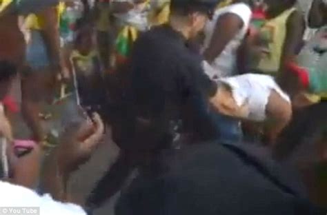 nypd officers bumping and grinding with dancers at west indian day parade video daily mail online