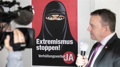 swiss agree to outlaw facial coverings in ‘burqa ban vote euractiv