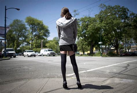 a sex trade worker is pictured in downtown vancouver onjune 3 2014
