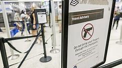 TSA officials demonstrate how to properly pack your gun for travel