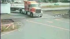 Semi Truck Tries To Outrun Train