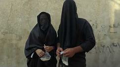 Iranian shiite women with their faces hidden by a veil for Chehel Minbari, Khorramabad, Iran