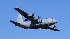 (U.S Air Force) Lockheed C-130H Classic Hercules flying overhead at 23,000 ft