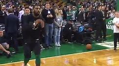 NBA - Kyrie Irving hits the floor to warmup, leading his...