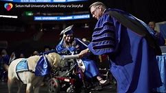 Service dog receives diploma alongside owner at college graduation