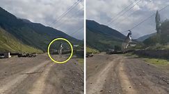 Hang in there: Goat's horns comically get stuck on electrical wires
