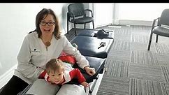 Adjustment on a Toddler Demonstrated by Grand Blanc Chiropractor