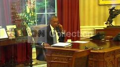 PRESIDENT OBAMA ON THE PHONE IN OVAL OFFICE