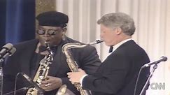 1993: Clinton plays the saxophone