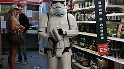 ‘Stormtrooper’ goes shopping for supplies in life-size costume