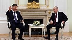 Vladimir Putin denies 'Cold War military alliance' between Russia and China