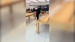 Brazen thief steals over 40 iPhones from Apple store as police car is parked outside