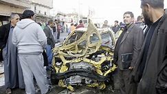 Suicide bombings kill scores in Iraq