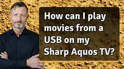 How can I play movies from a USB on my Sharp Aquos TV?