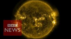 Solar flares: Footage released by Nasa - BBC News