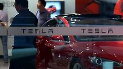 Tesla says it’s in talks with BMW over batteries, parts