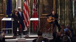 Kerry's message to France: "You've got a friend" - literally