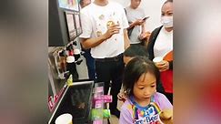 Excited locals visit first-ever 7-Eleven store in Communist Laos