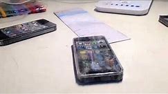 Covering papercraft iPhone 3GS with 3 layers of clear tape