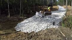 Installing A Culvert Pipe For The Driveway And Covering With Surge