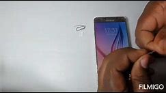 How To Open SIM Card Tray Of Your Phone Using Paper Clip