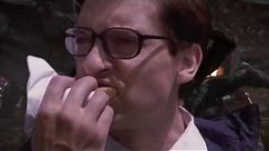 Peter Parker eats a hotdog while The Avengers fight Thanos