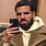 Drake Looking at Phone