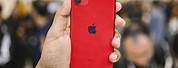 Red iPhone 11 Pro in Hand