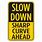 Sharp Turn Slow Down Sign