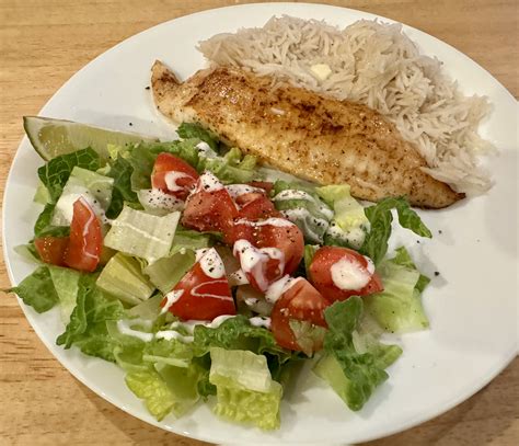 Tilapia with rice and salad. 3/31/26 | Omnivore