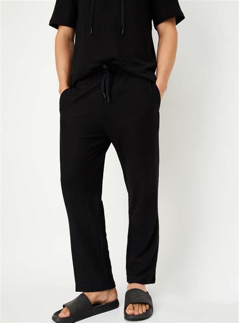 Buy Men Textured Regular Fit Trousers Online at just Rs. 799.0 ...