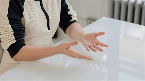 Crossing your arms, touching a piece of jewelry, smoothing your skirt ...