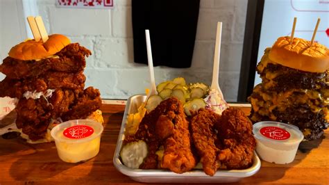 Man attempts 16-patty burger, quad chicken sandwich and spicy fries in one challenge - genus of chicken