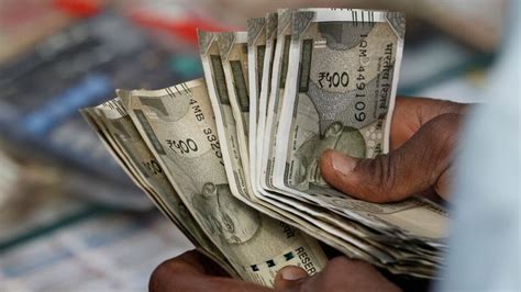 Rupee sinks to record low as oil spike and Fed stance pile on pressure