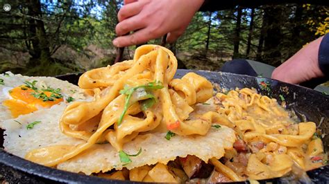 Watch how this forest carbonara comes together over open fire