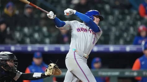 Mets defeat Rockies 10-5 in snow-delayed game