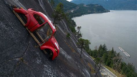Car shell suspended on rock face in British Columbia sparks investigation