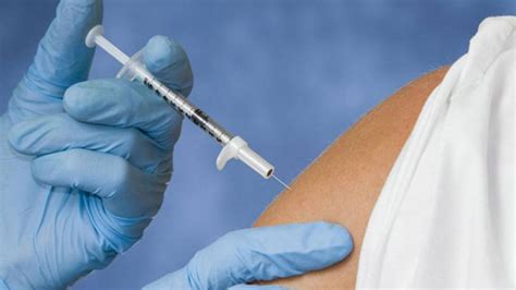 Flu Shot Linked To Fewer, Less Severe COVID Cases