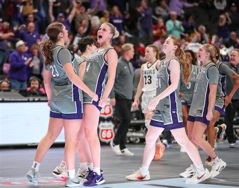 K-State’s Nastja Claessens plays with Belgian parents watching from stands