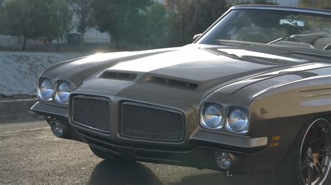 A restored and modified Pontiac GTO built to impress