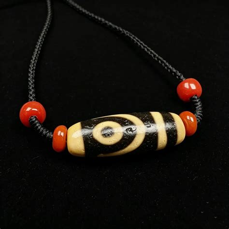 2 Eyes Dzi Bead Meaning: Benefits, Symbolism & How to Use – Gandhanra-ART