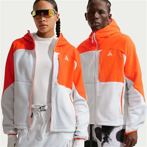Orange Zip avant Hauts. Nike CA